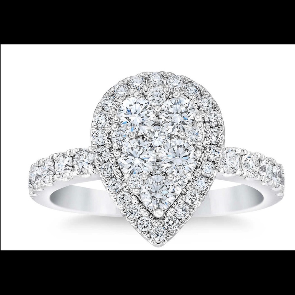 Brand new Diamond pear shaped white gold ring.